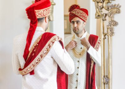 cinecrown-indian-wedding-photography-groom-alone-infront-mirror