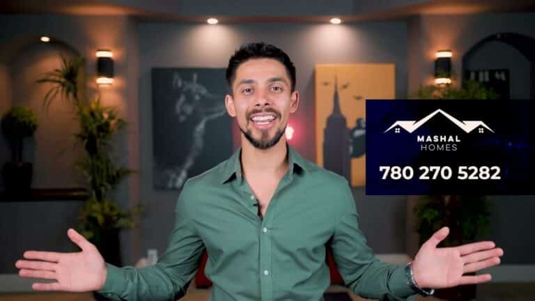 Modern man smiling in home interior promoting Mashal Homes Edmonton, real estate and home construction services.