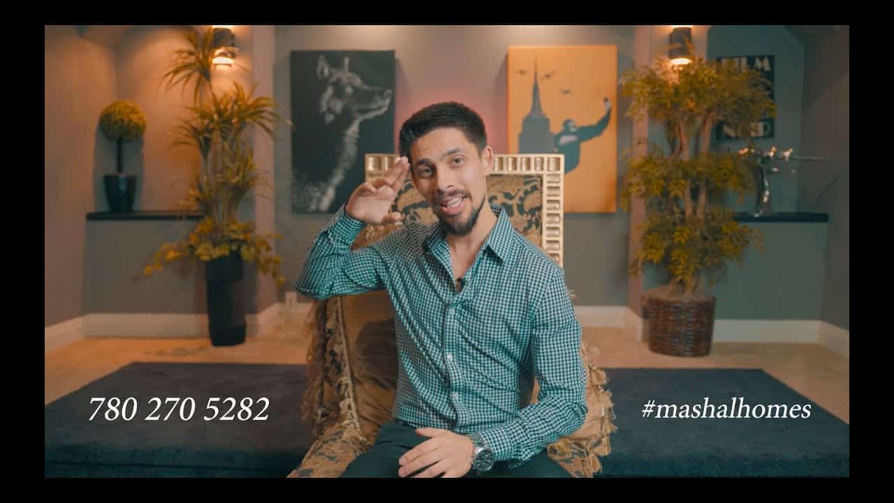 Elegant interior of Mashal Homes Edmonton showcasing modern decor and artwork for a luxurious living experience.