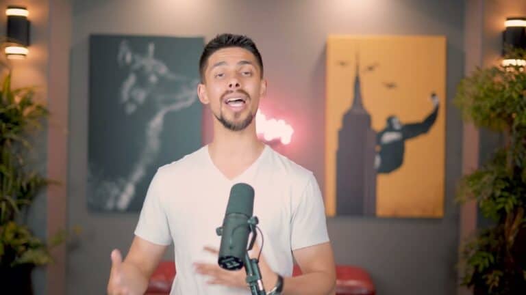 Modern man speaking in a home studio with colorful artwork and plants in Edmonton.