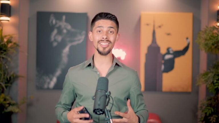 Bright man speaking into microphone in modern studio for Mashal Homes Edmonton promotion.