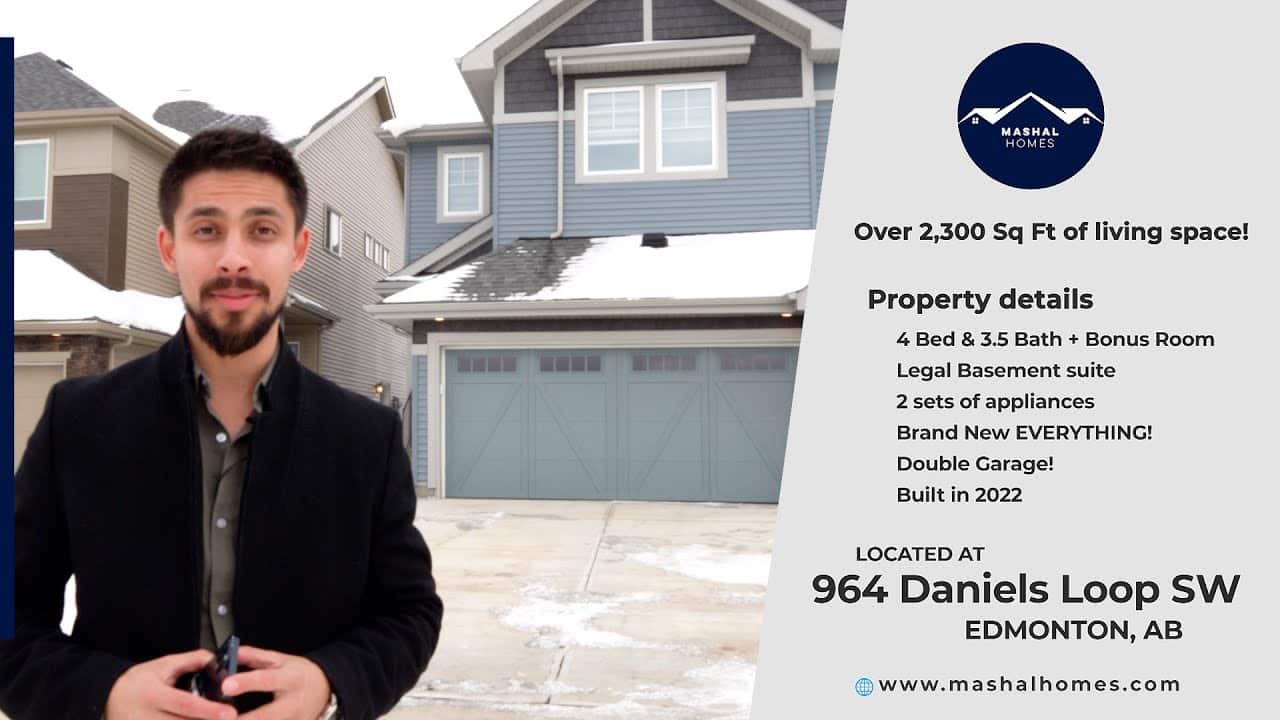 Modern Edmonton home front exterior with blue siding and double garage.