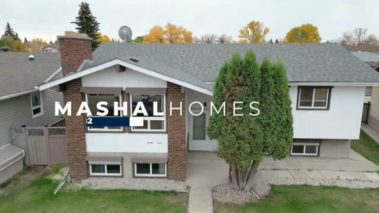 Modern Edmonton home with landscaped front yard and contemporary design.
