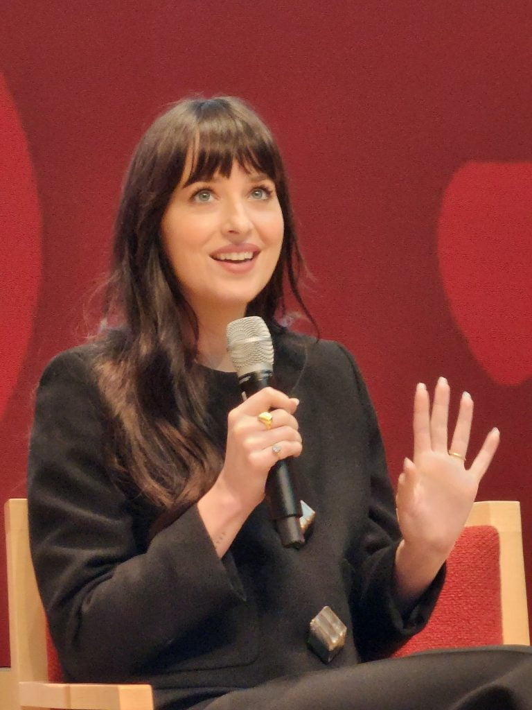 Dakota Johnson Attended The 32nd Annual Women in Business Conference At Harvard Business School