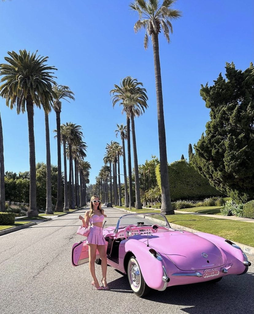 Margot Robbie Spotted in Pink Ensemble with Bottega Veneta Bag at 'Barbie' Press Tour in Los Angeles