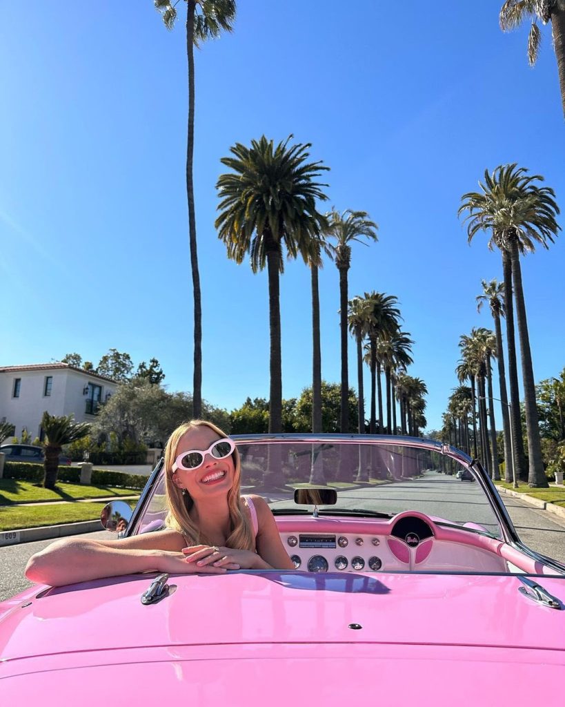 Margot Robbie Spotted in Pink Ensemble with Bottega Veneta Bag at 'Barbie' Press Tour in Los Angeles