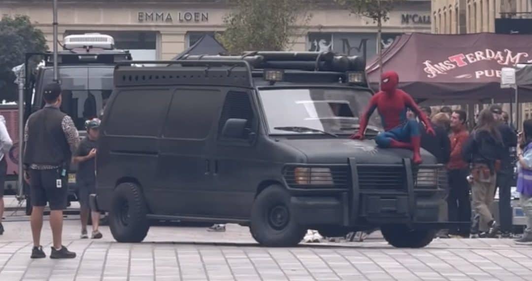 The first look at Tom Holland’s Spider-Man atop the Punisher van on the set of Marvel’s Spider-Man: Brand New Day in Glasgow, Scotland has been revealed.