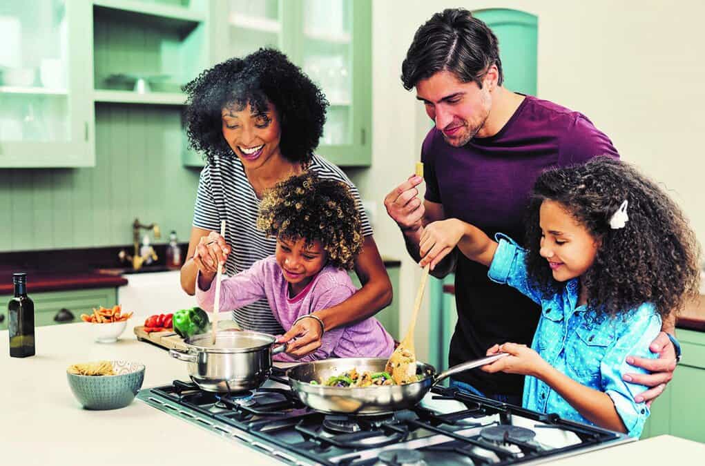 Nutritious meals prepared in a warm, family-friendly kitchen, highlighting Meals in Motion’s focus on healthy food delivery and community support for better health.