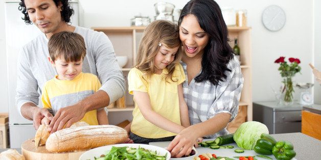 Fresh family preparing healthy meals together in a modern kitchen promoting nutritious eating and family bonding