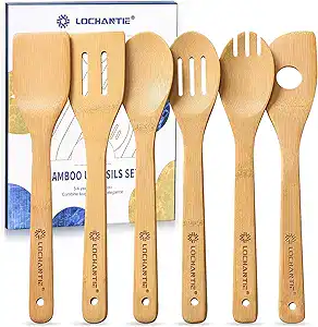 Bamboo cooking utensils including spatula and spoons on packaging eco friendly kitchen tools ideal for cooking baking and food preparation