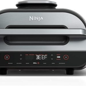 High tech Ninja foodie indoor grill and air fryer with digital controls and sleek design ideal for preparing healthy meals quickly and conveniently