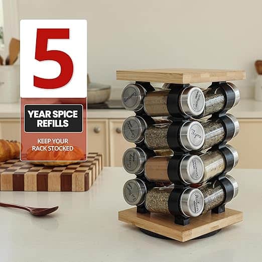 Spice rack with six labeled jars in a modern kitchen