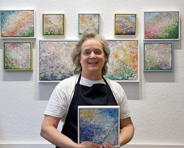 Black Meg Holding Carnations White Frame