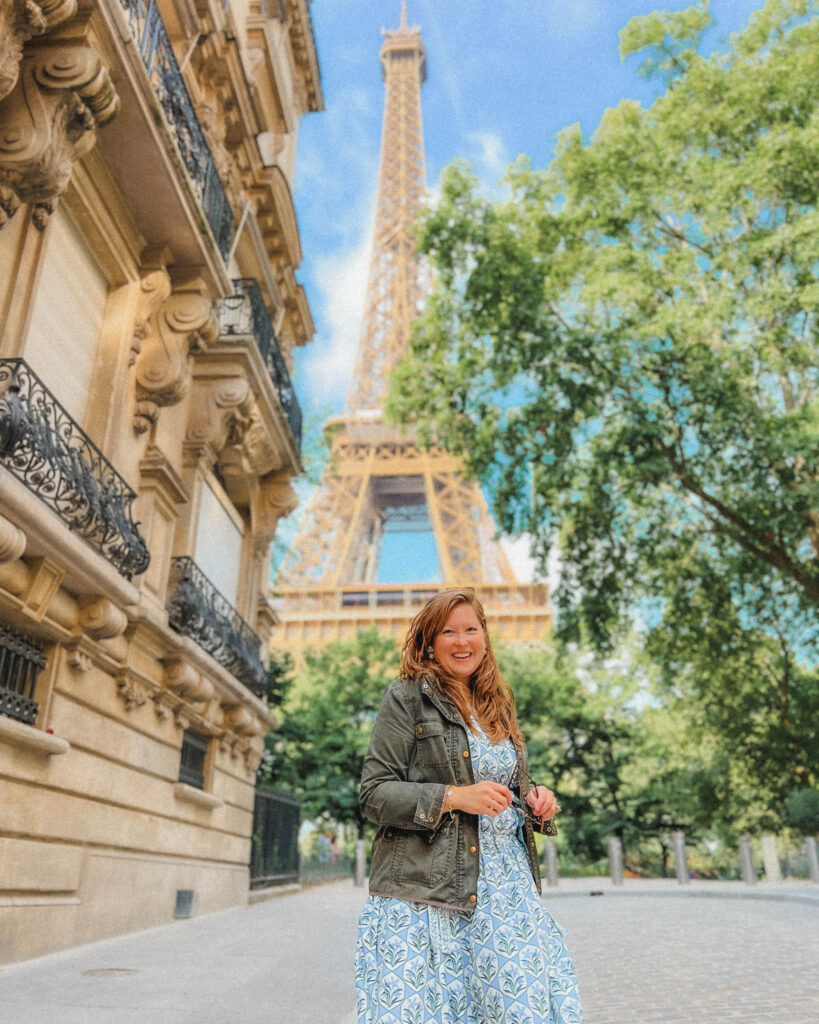 Paris is one of the most beautiful cities in the world, and for good reason! Here's one of the best views of the Eiffel Tower in Paris at Rue de l'Universite. This street will end up in a dead end with four to five story Parisian buildings on either side and the Eiffel Tower right in the middle, surrounded by lovely foliage.