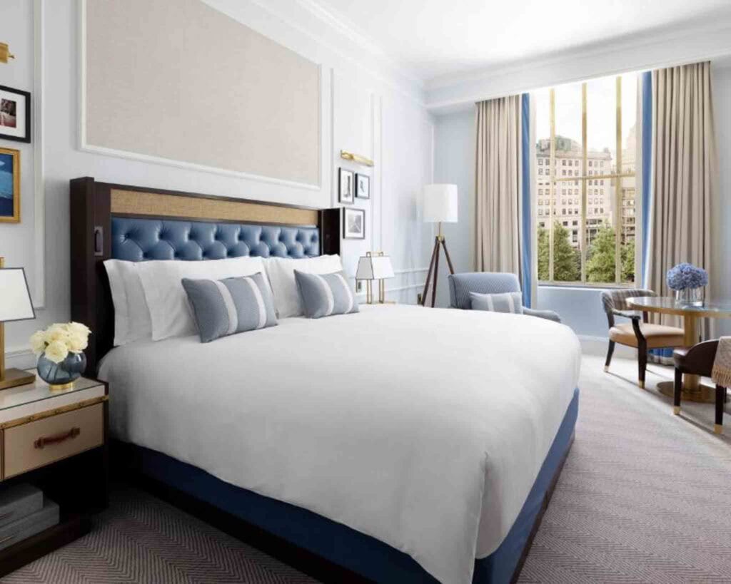 Here's an example of one of the rooms at the Langham Boston, a five-star hotel in downtown. The rooms display nautical colors of varying blues with crisp white bed linens. This room also has an incredible view of downtown Boston.