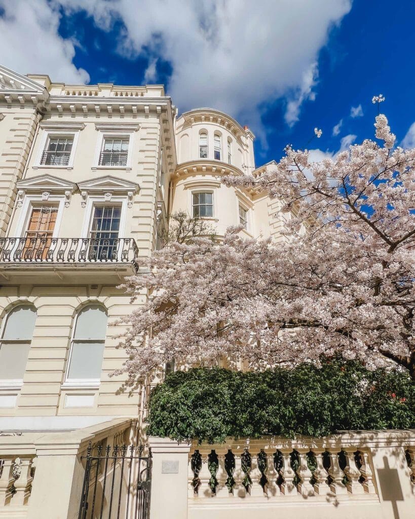 Kensington is one of the most beautiful neighborhoods in London and it's one of the best places to consider when researching where to stay in London first time. The grand Victorian architecture here featuring elegant stucco and the most beautiful cherry blossom tree out front is classic in Kensington.