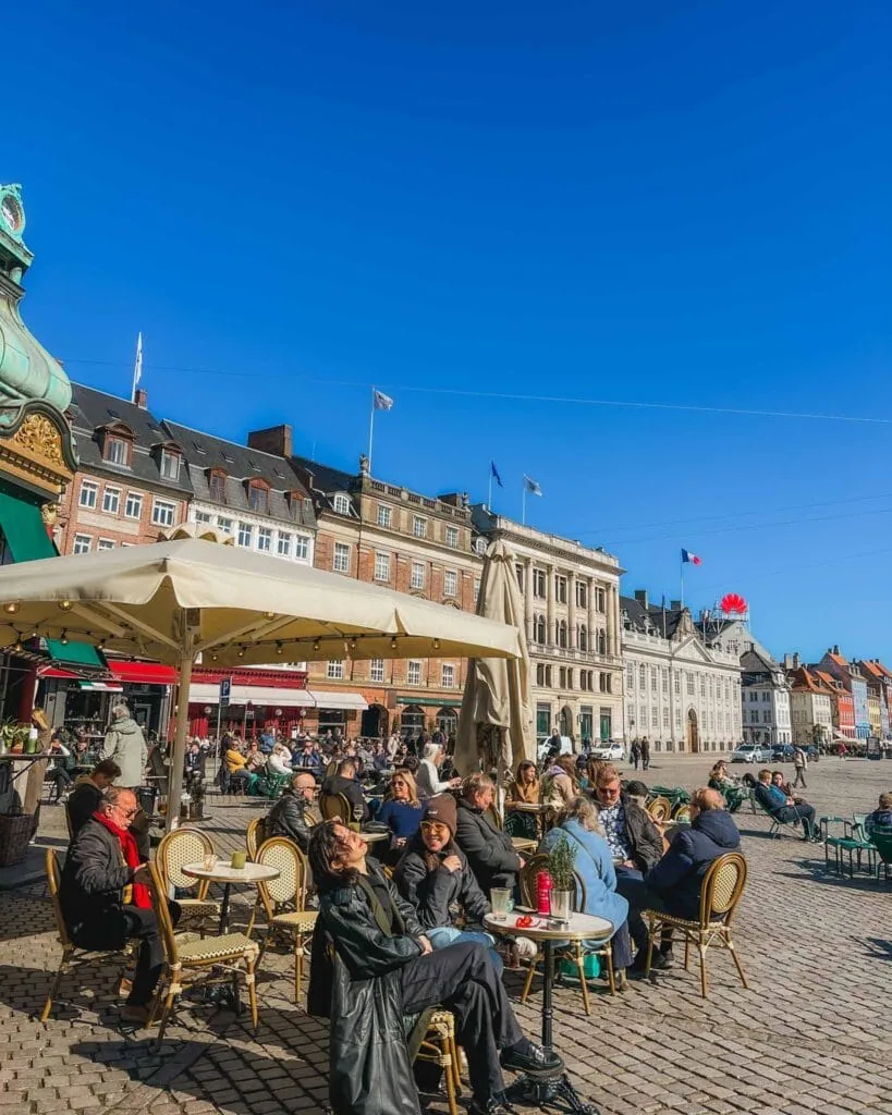 The area of Indre By is one of the best places to stay if you're looking for where to stay in Copenhagen your first time. It has plenty of outdoor cafes such as this one, some what overlook the harbor- it reminds me of Paris!