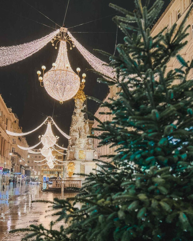 Graben Street is one of the most beautifully decorated streets in Vienna during the holidays. It's lined with Christmas trees and these oversized lit chandeliers draping the street.