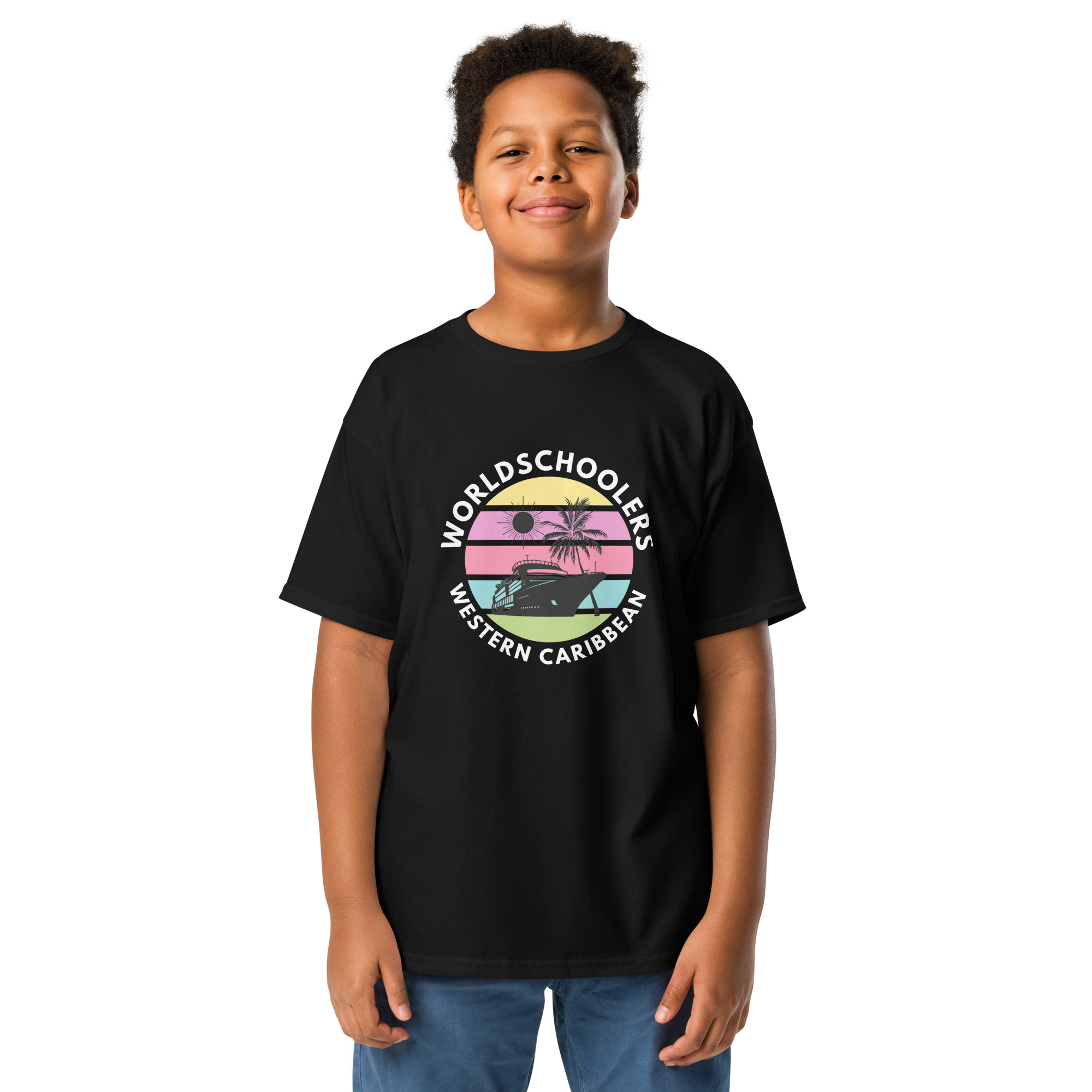 Vibrant kid's graphic tee featuring "Worldwide Schoolers" design with a boat, palm trees, and sunset, perfect for summer adventures and casual wear.