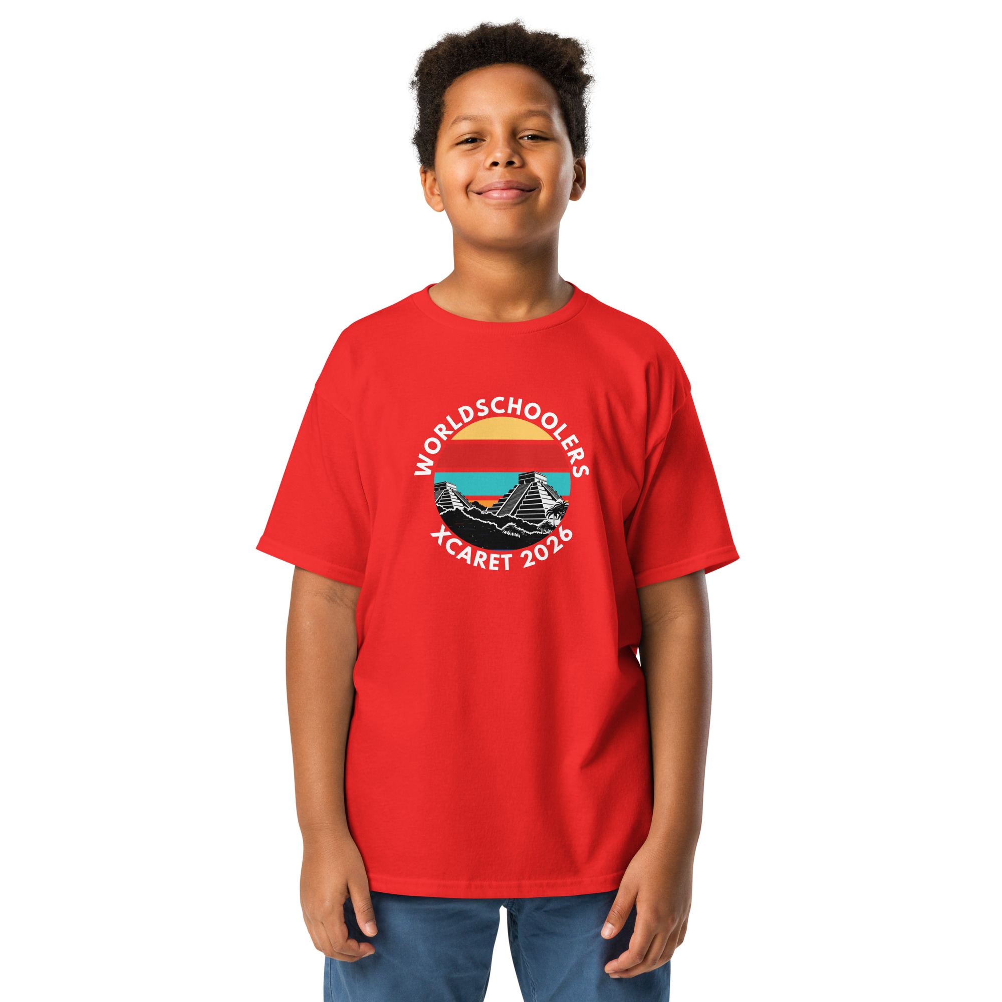 Child wearing a red Xcaret 2026 Youth Classic T-shirt with a graphic design, perfect for kids' casual wear and themed events.