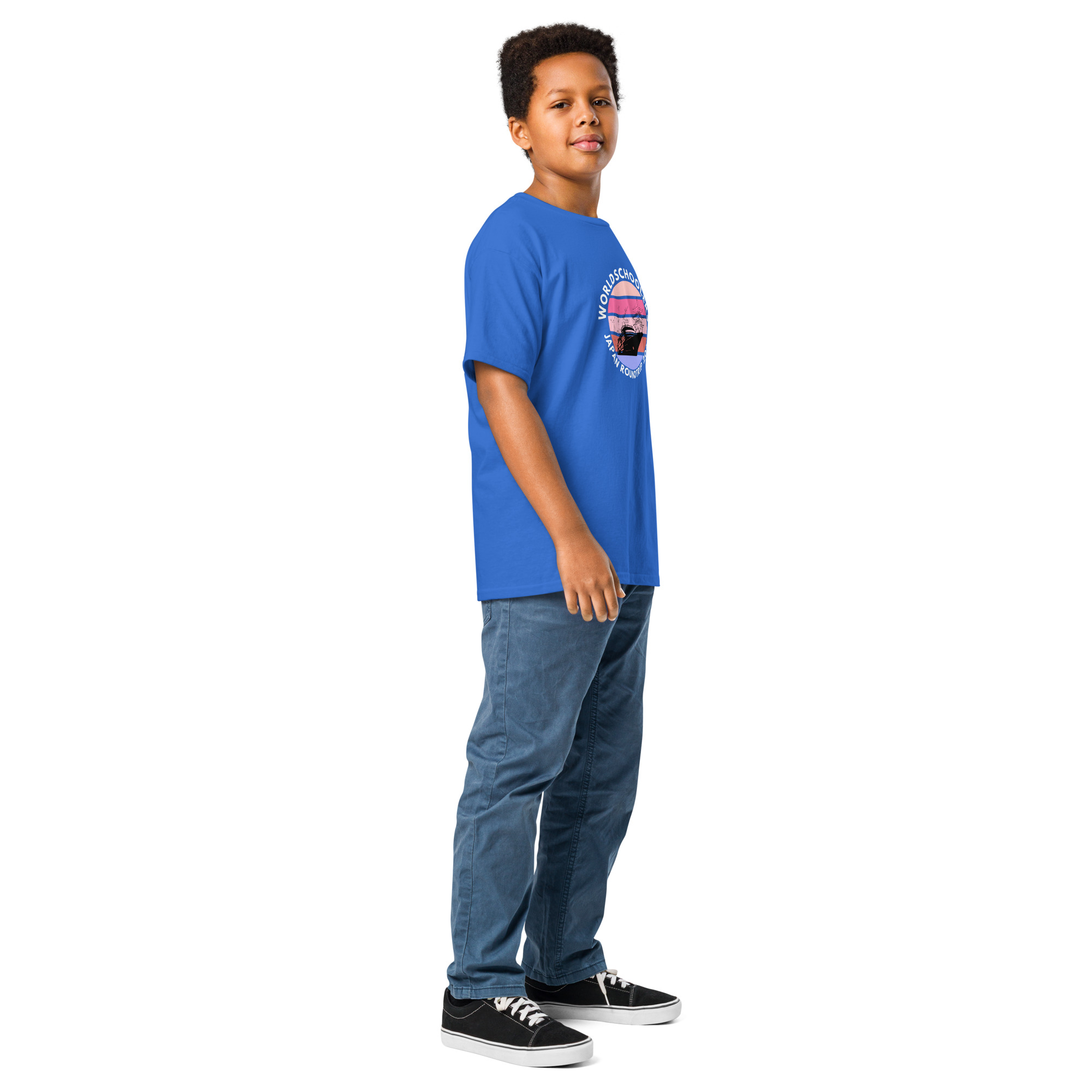 Child wearing a blue Melody Lane graphic tee with Japan roundtrip design, standing confidently. Perfect for youth travel enthusiasts and fans of Japanese culture.