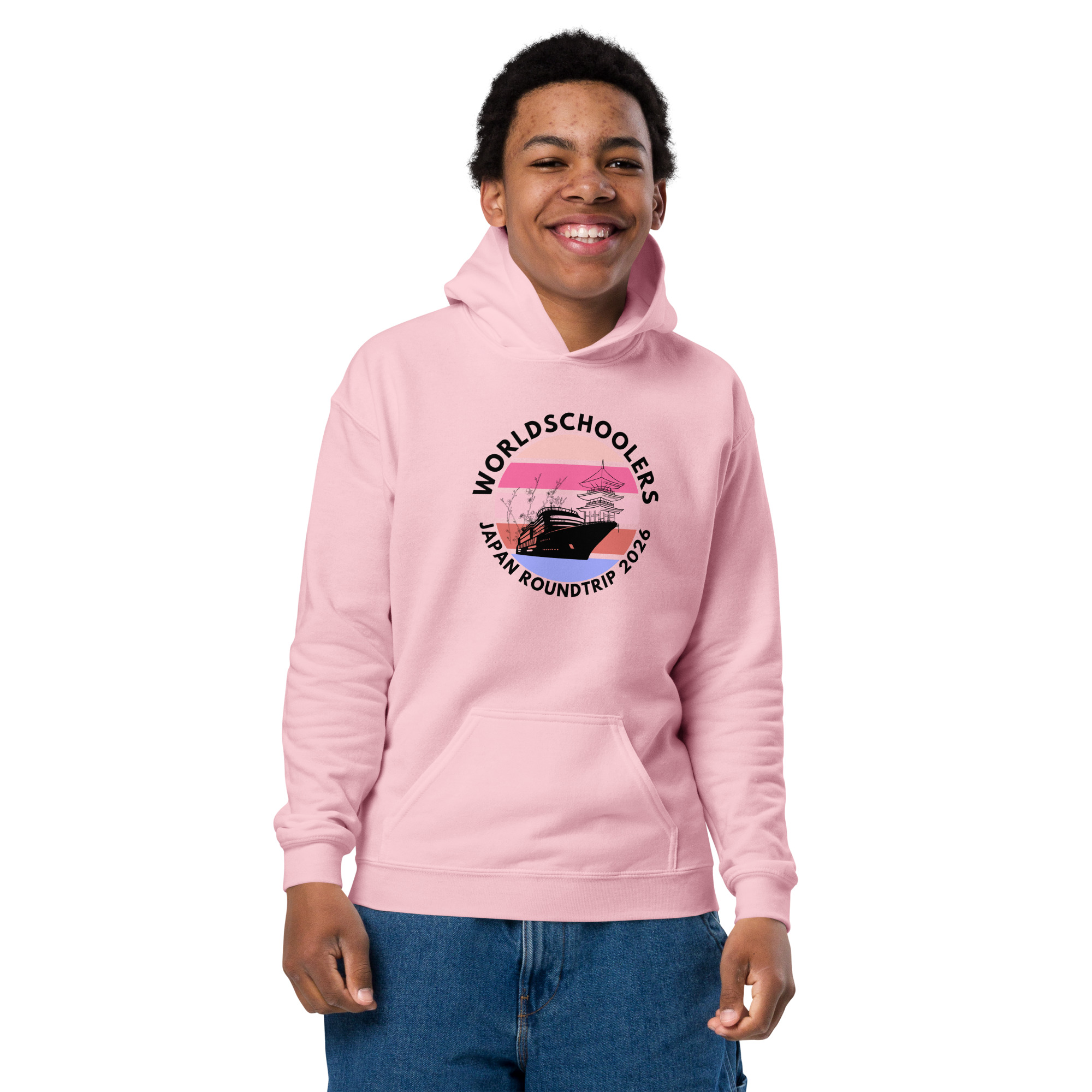 Youth wearing pink hoodie with "Japan Roundtrip 2026" graphic, promoting Melody Lane graphic tees and travel-themed apparel.
