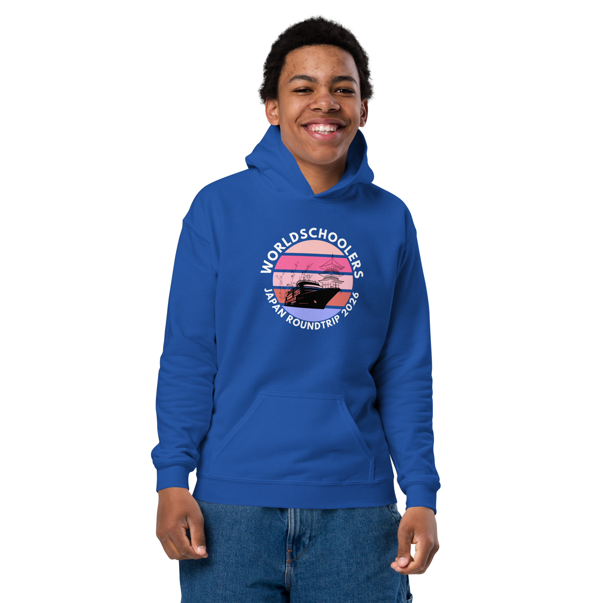 Youth wearing a blue hoodie with "World Schools Japan Roundtrip 2026" graphic, perfect for travel and school events.