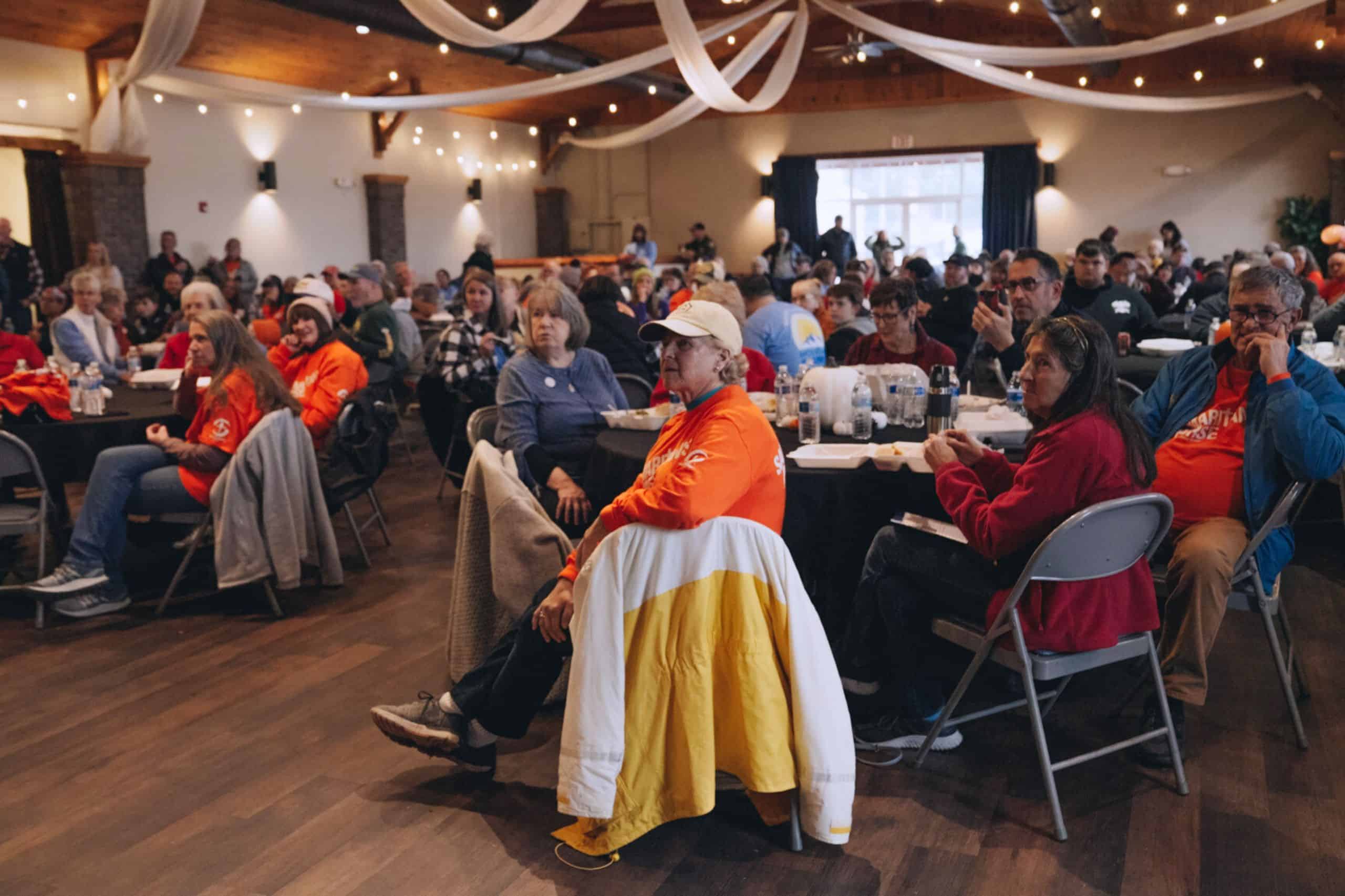 Families gathered in Burnsville, NC, sharing a warm Thanksgiving meal together.