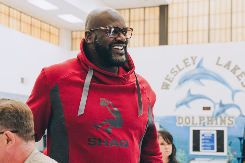 Shaquille O'Neal hosting the Shaq-a-Claus event.