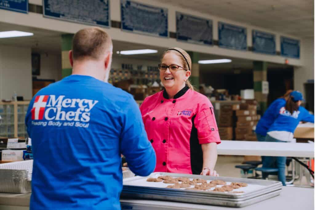 Chef Alicia and a volunteer preparing meals for flood victims in Kentucky.