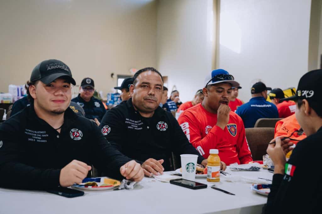 First responders enjoying a Mercy Chefs meal in Kerr County, TX