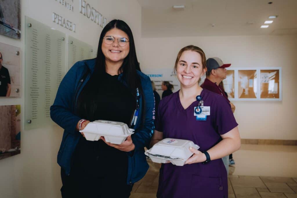 Medical staff receiving Mercy Chefs meals in Kerr County, TX