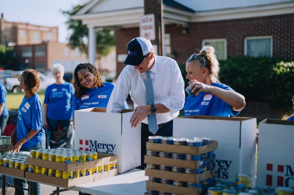 Virginia Governor Glenn Youngkin packs groceries for families in need at Mercy Chefs' HQ