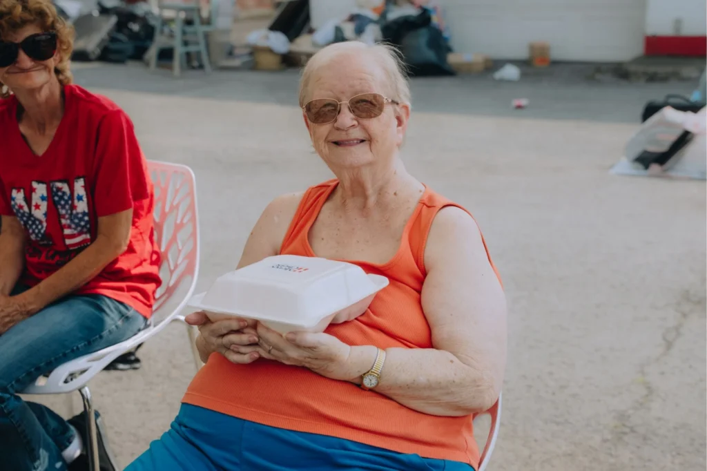 Wilma, a flood victim in West Virginia, receives a hot meal