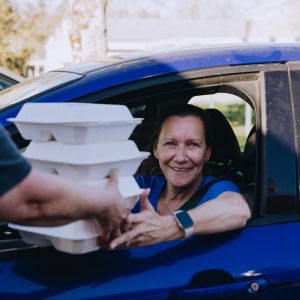 A tornado victim receiving a Mercy Chefs meal in Mississippi.