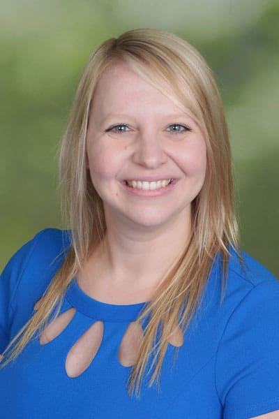 Friendly healthcare professional smiling, representing MHP medical services.