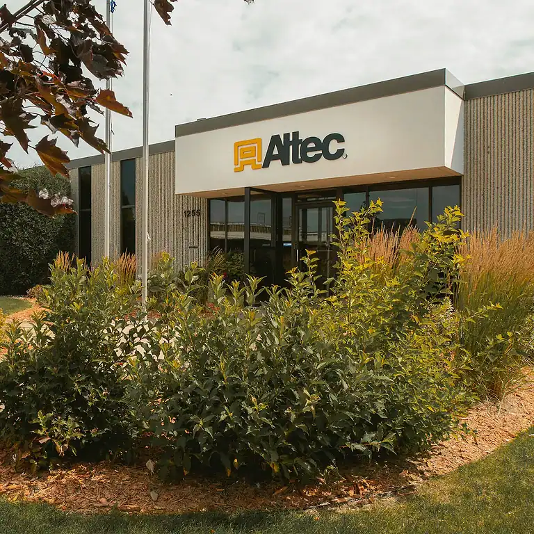 Well-maintained landscaping in front of Altec office building.