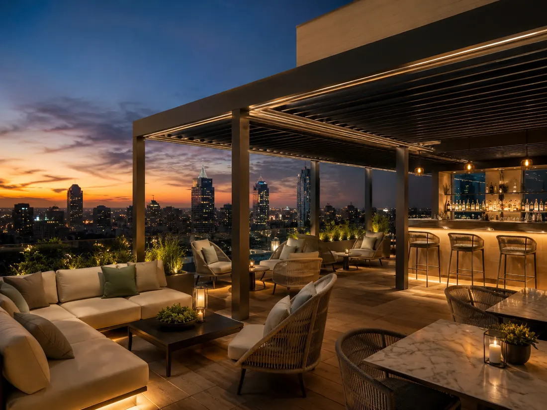 Rooftop dining terrace with pergola and lounge seating