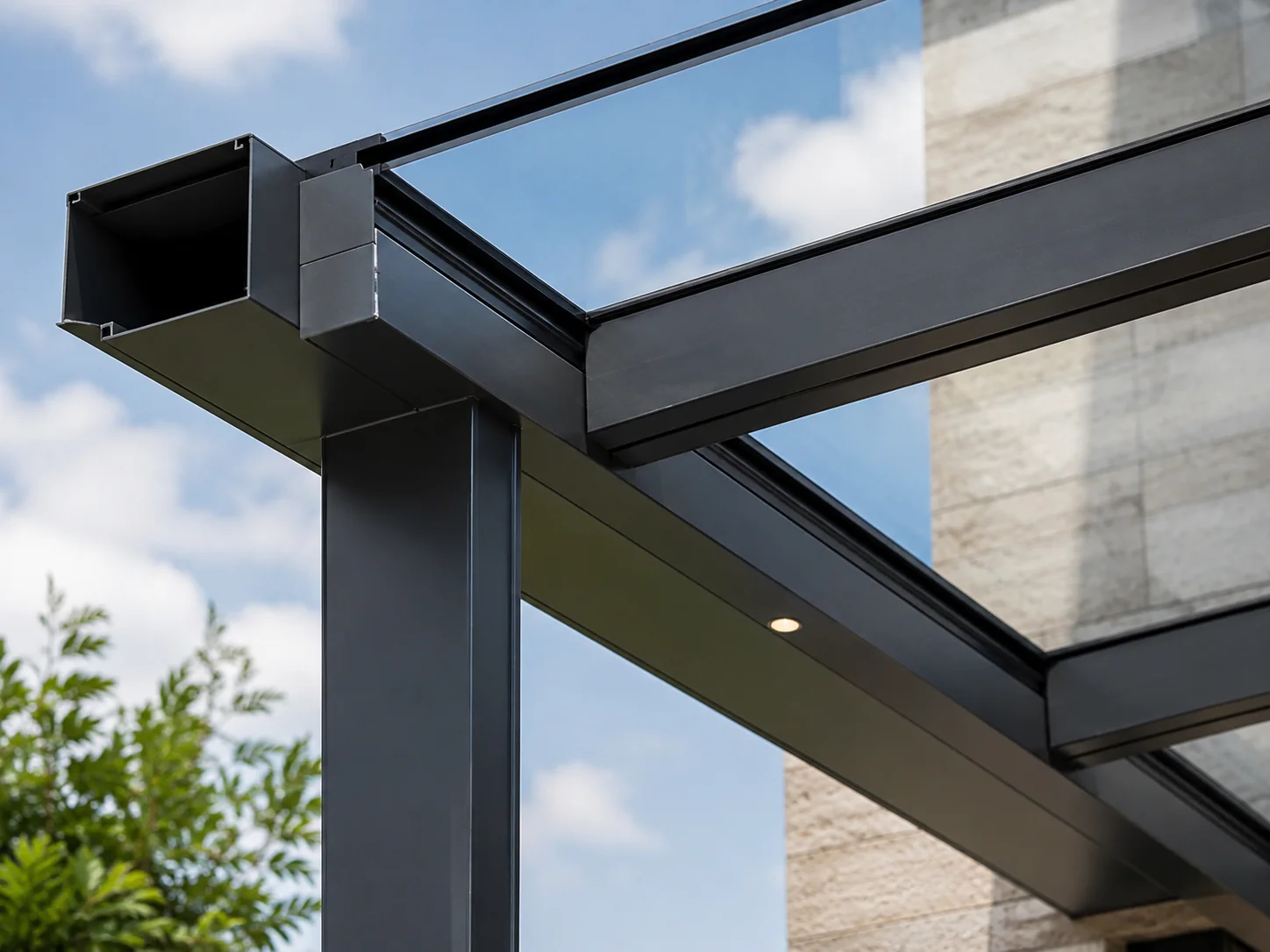 Engineered aluminum frame and glass enclosure detail for pergola structure