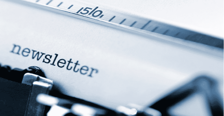 A typewriter with the word newsletter written on it.