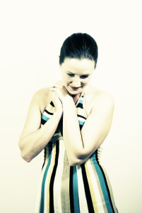 Shy woman looking downwards