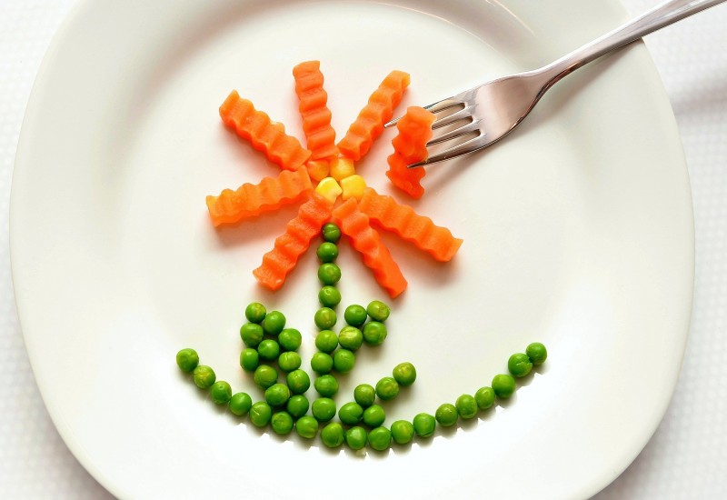 carrots and peas on a plate