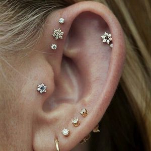 girl's ear piercings to reinvent her look
