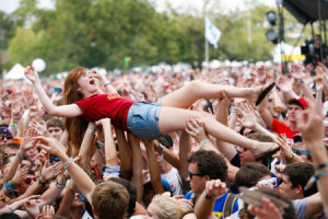 summer music festival girl crowd surfing