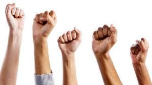 People putting fists in the air