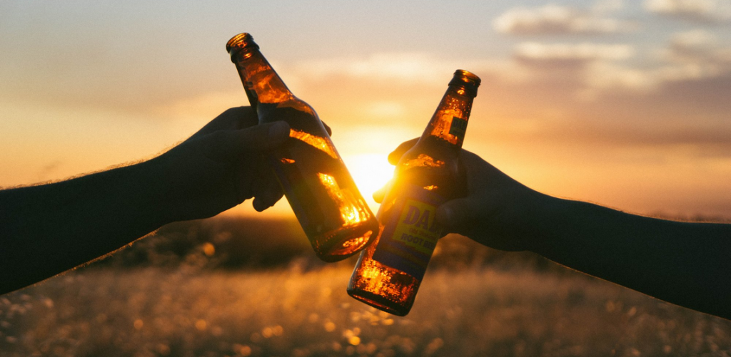 two friends drinking together