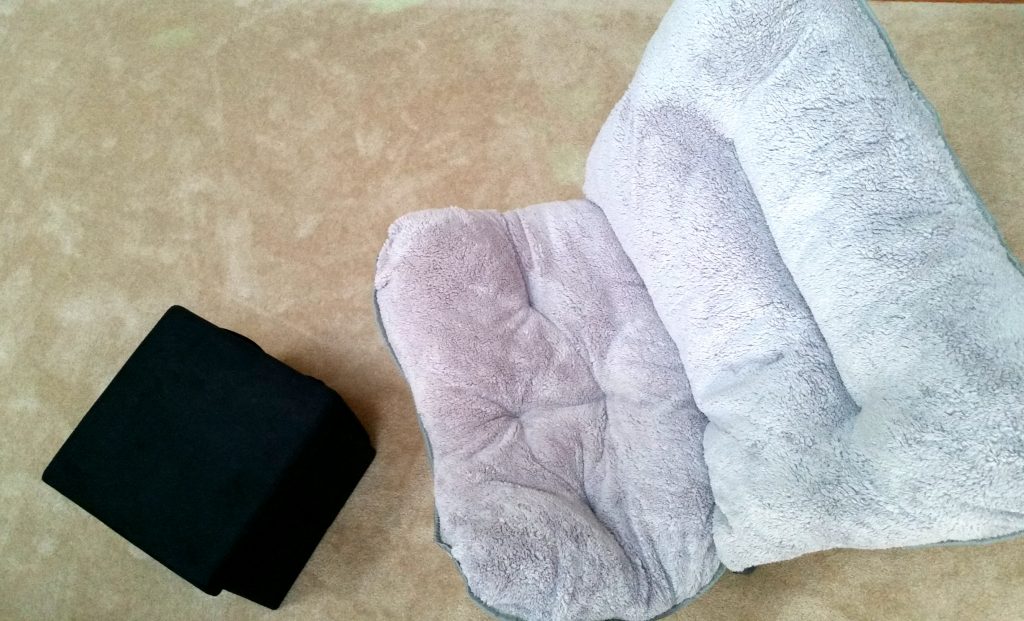 chair and ottoman in the best dorm room on campus