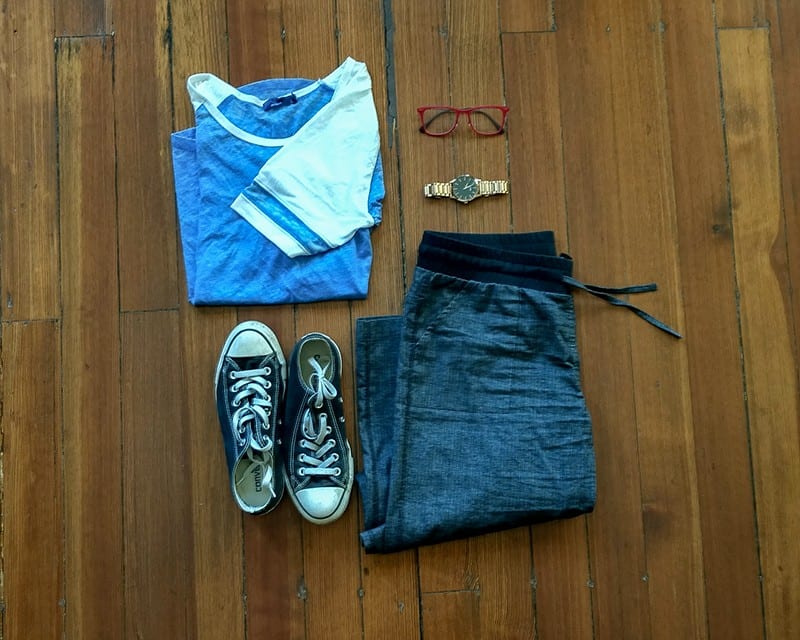 clothing laid on the floor for a capsule wardrobe