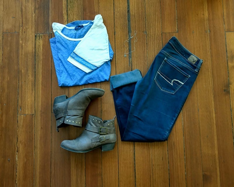 clothing laid on the floor for a capsule wardrobe