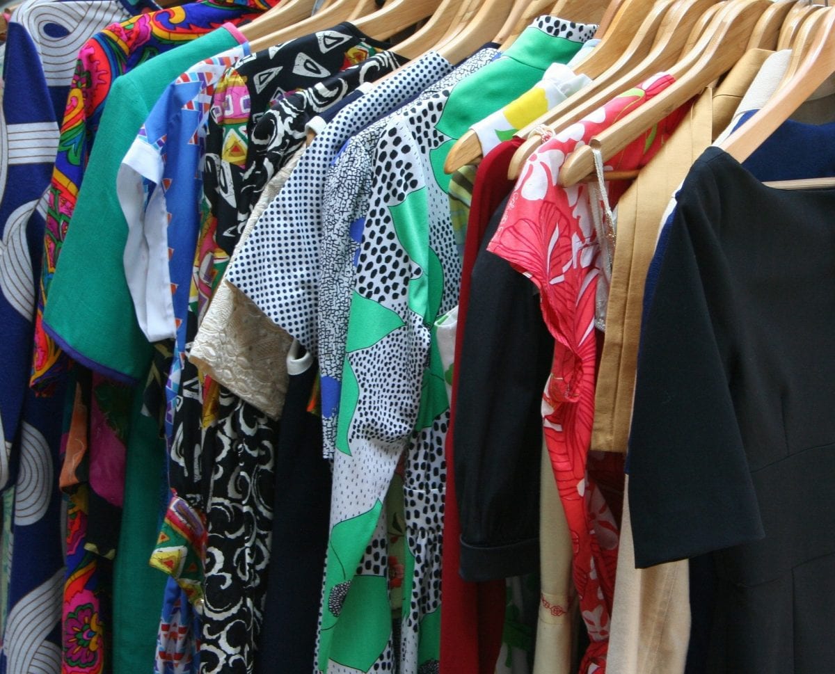 closeup of dresses on hangers
